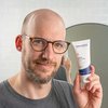 Photo of a man applying the product.