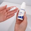 Photo of hands showing the texture of the product.