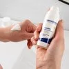 Photo of hands showing the texture of the product.