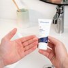 Photo of hands showing the texture of the product.